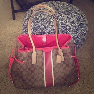 Coach brand handbag.
